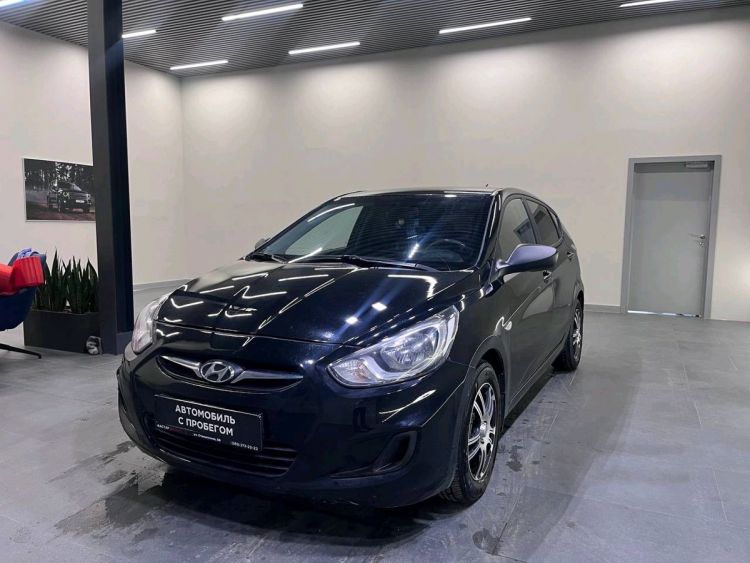 Hyundai Solaris чёрный, 1.4 AT (107 л.с.)