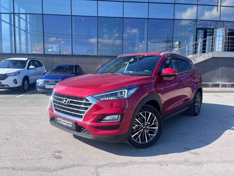 Hyundai Tucson красный, 2.0 AT (150 л.с.) 4WD